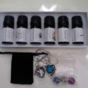 Essential Oil Diffuser Necklace and oils